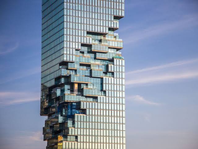 Pixelated facade detail. Architecture as economic signal.