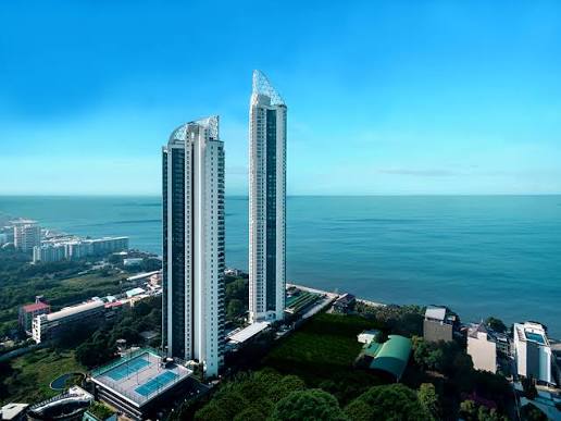 Twin beachfront condominium towers in Wongamat with direct sea frontage over the Gulf of Thailand