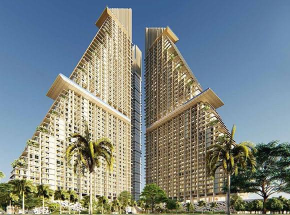 Pyramidal twin residential towers with sky garden crowns in central Pattaya